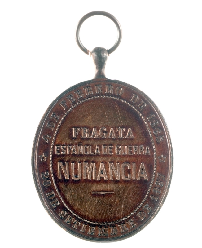 REVERSO. Medalla a los tripulantes de la Fragata Numancia.